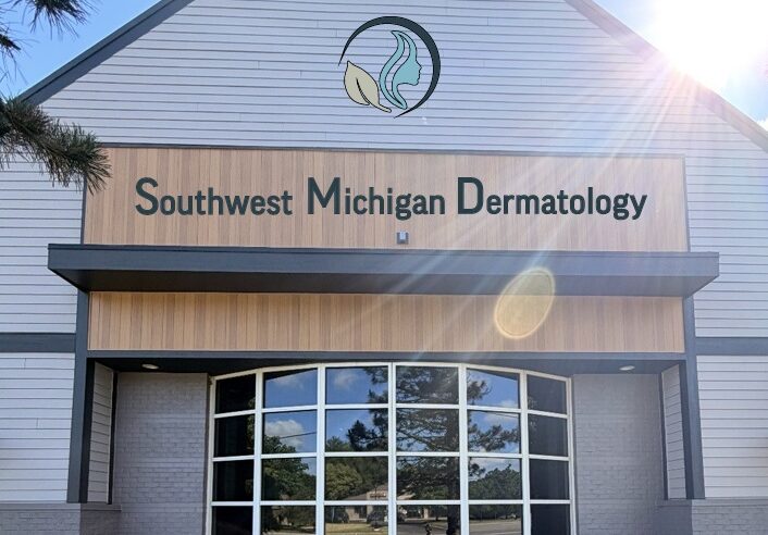 A side-of-the-building mockup of the Grand Rapids Southwest Michigan Dermatology Location.